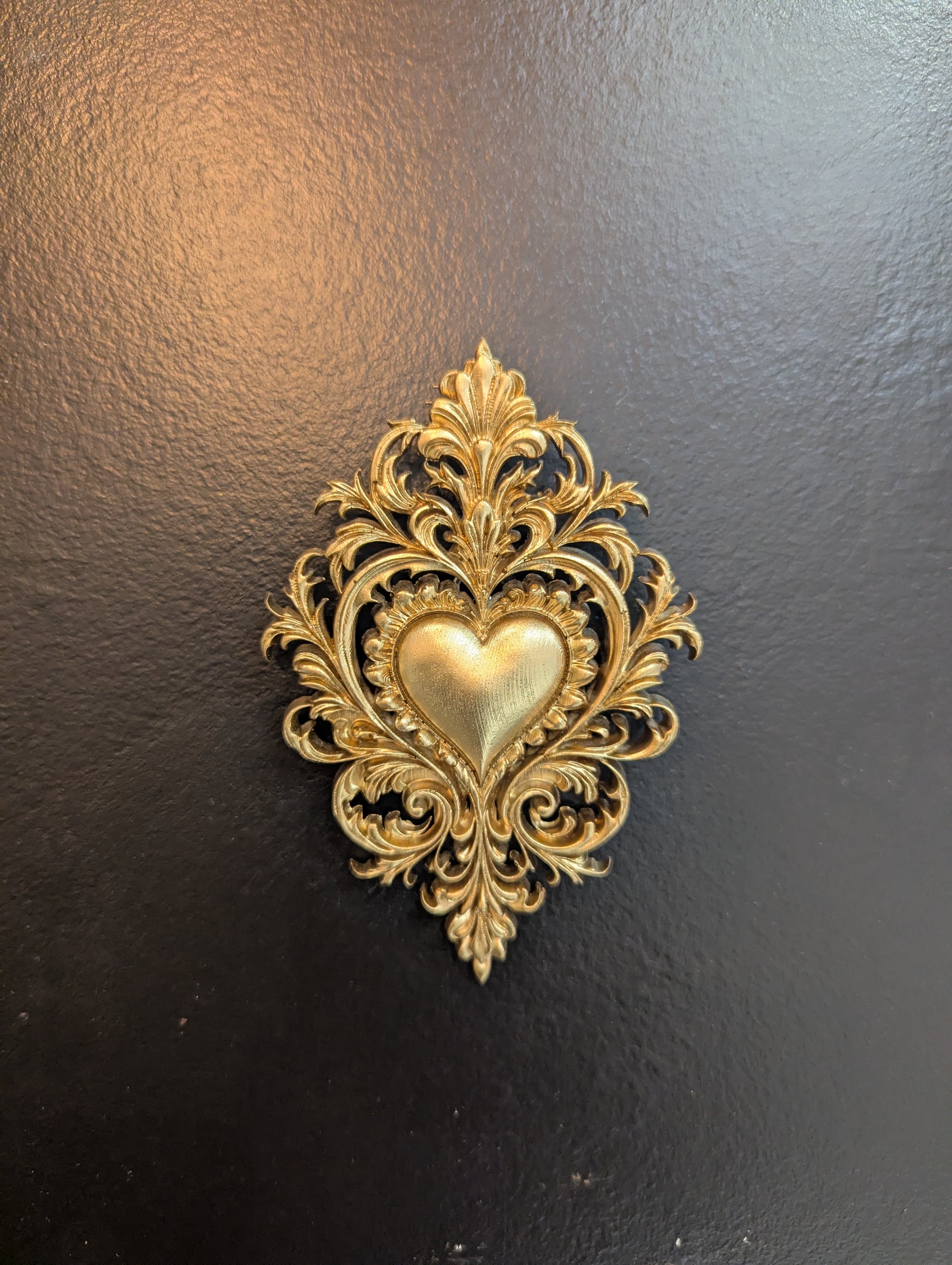 Coeur sacré dans cabeinet de curiosité