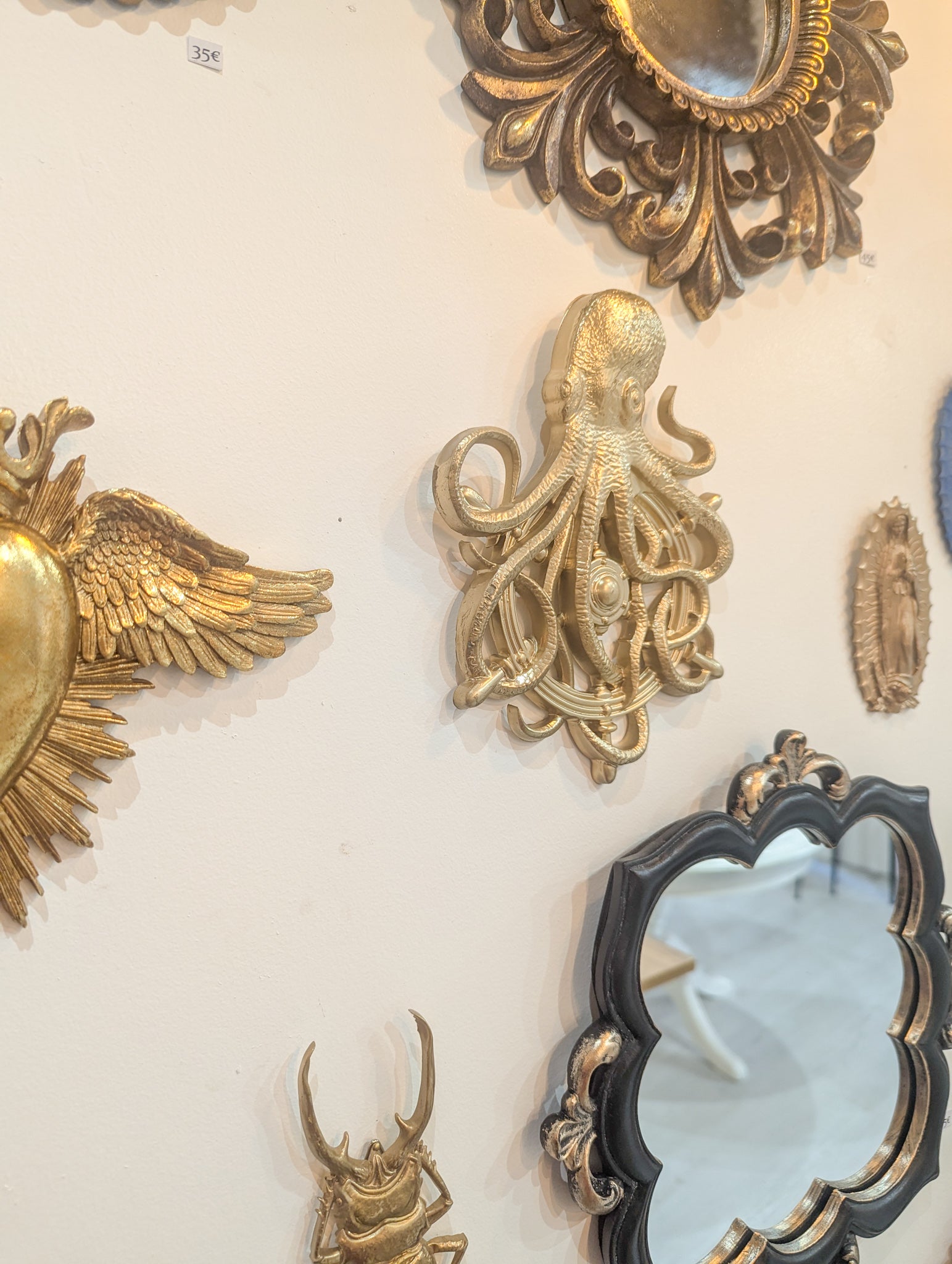 Pieuvre artisanale dorée esprit pirate et décoration murale cabinet de curiosités